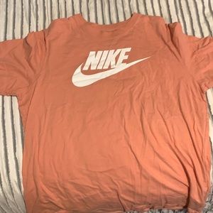 Pink Nike large shirt.